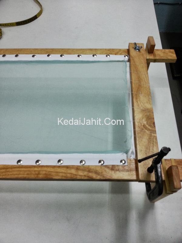 Pemasangan pemidang Tambour Beading